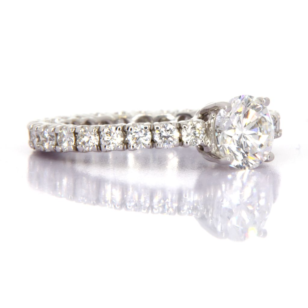 ANELLO SOLITARIO Ct1,26 G VVS2 IGI 134469757 Con contorno diamanti 1,30CT F/G VVS GR.3.72