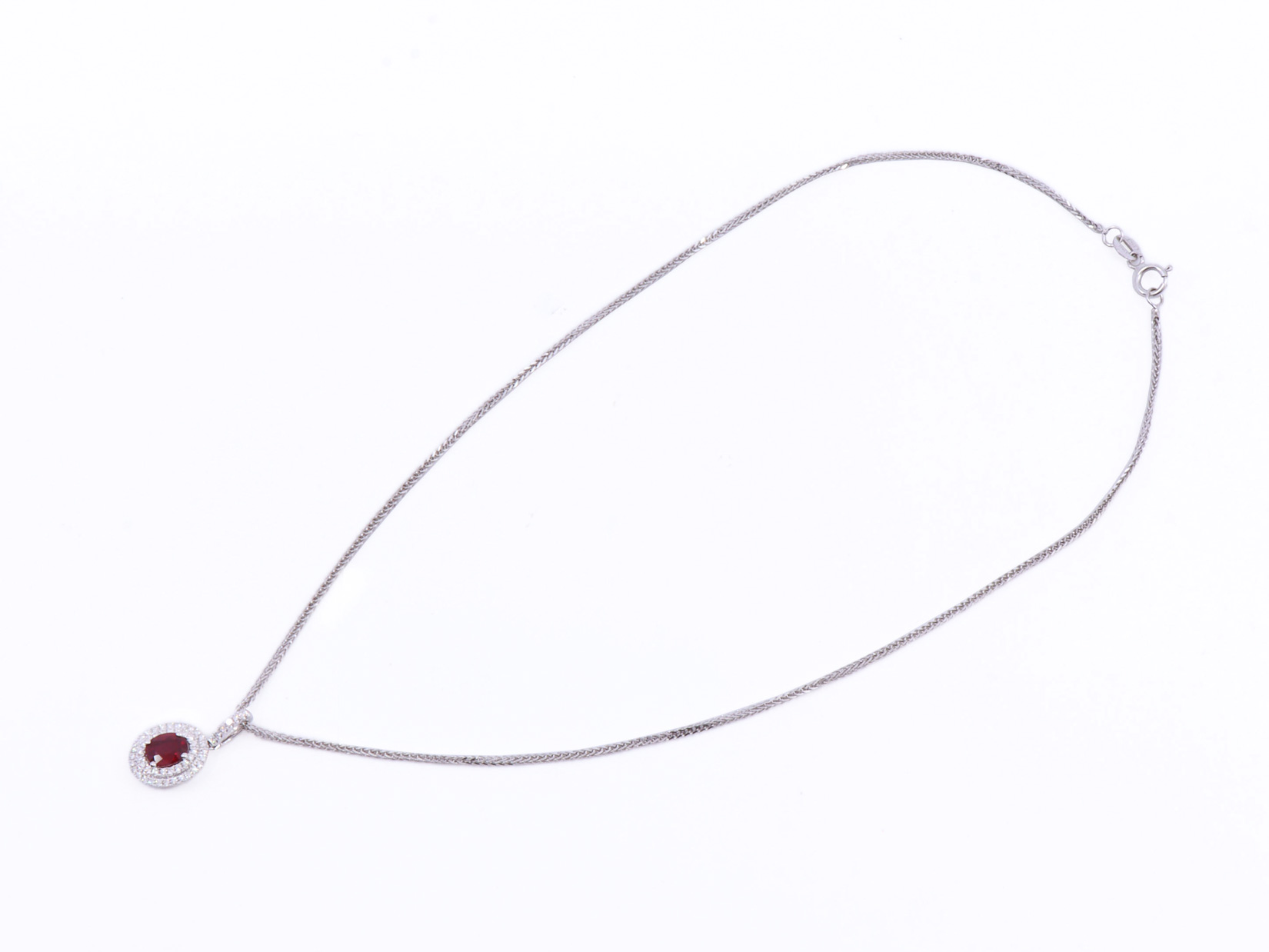 Collana in oro bianco 18Kt con ciondolo in oro bianco 18kt gr3,00, brillanti 0,60ct F-VVS e rubini 0,85ct