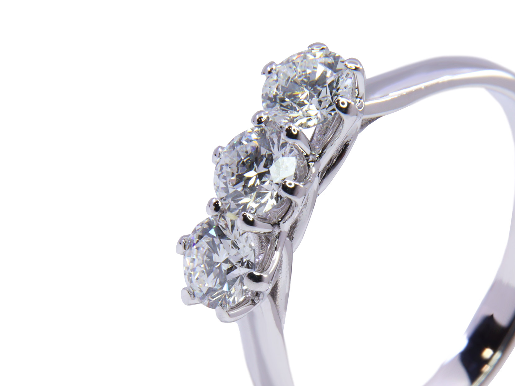 Anello Trilogy oro bianco 18Kt gr2.80 - caratura complessiva 0.91ct DSI1