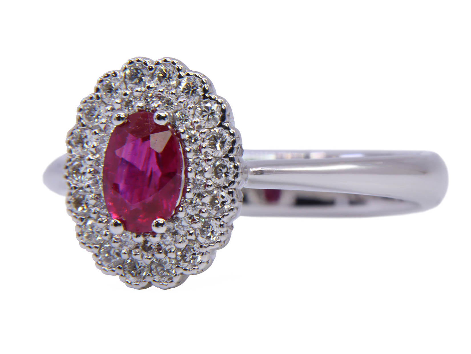 anello ob. Con rubino ovale centrale ct. 0.66 mozambico e brills attorno ct. 0.30 fg vvs