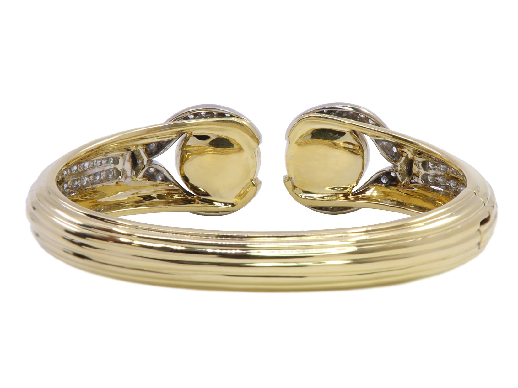 Bracciale rigido - Brillanti e pietre verdi, oro18kt. peso totale 58,5gr