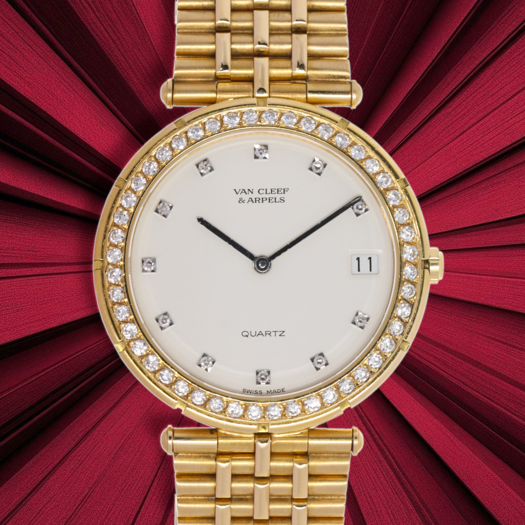 Van Cleef & Arpels, 18kt Yellow Gold, 34 mm, Quartz, Natural Diamonds Bezel and Dial, total weight 118 gr. Our Box & warranty